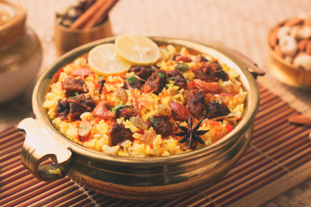 istock Mutton biryani Chicken biryani Spicy Indian Malabar biryani Hyderabadi biryani, Dum Biriyani pulao clay pot Kerala India 1333124877