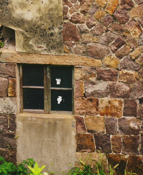 istock Windows of a stone house 1333125055