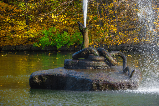 07.11.2020. Uman, Ukraine. Snake fountain in the Sofievsky arboretum or Sofiyivsky Park in Uman, Ukraine, on a sunny autumn day