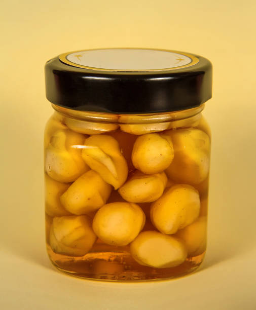 istock Canned nuts in honey. Home preservation. 1333128537