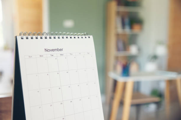 istock 2021 Calendar desk place on table. Desktop Calender for Planner to plan agenda, timetable, appointment, organization, management each date, month, and year on wooden office table.Calendar Concept. 1333129346