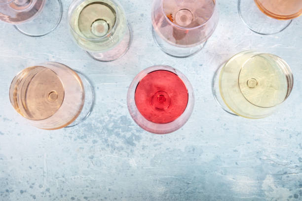 istock Rose and white wine, overhead flat lay shot with a place for text 1333132451