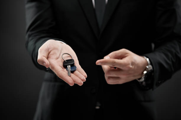 istock Finger pointing towards car keys 1333132682