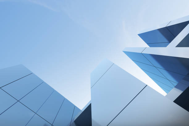 istock Low angle view of futuristic architecture, Skyscraper office building with cloud reflected on window, 3D rendering. 1333132790