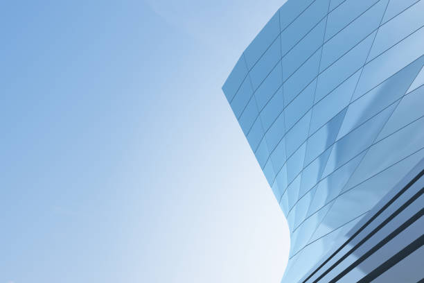 istock Low angle view of futuristic architecture, Skyscraper office building with cloud reflected on window, 3D rendering. 1333132791