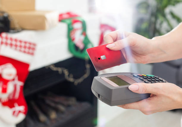istock Paying with credit card terminal 1333133933
