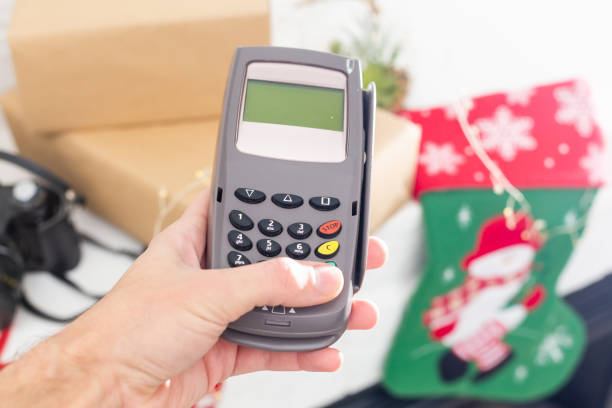 istock paid with pos and credit card, pos terminal, Christmas decor 1333134522