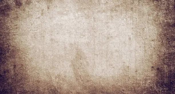 Photo of Texture of old vintage brown paper with a space For Text