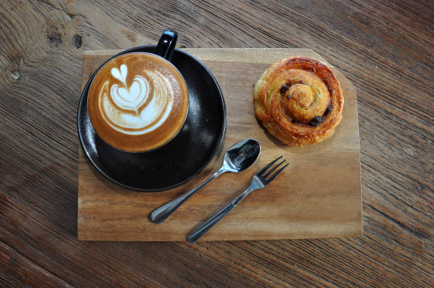 istock cup of latte coffee and bread 1333135135