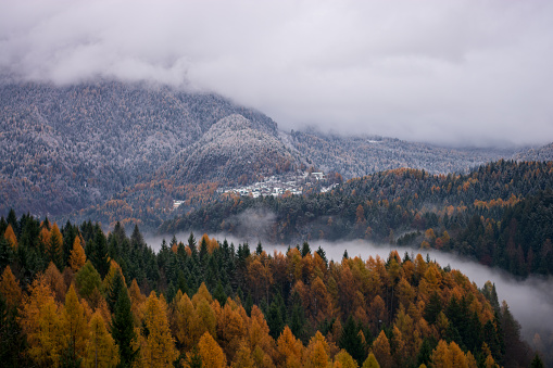 Miao village in a foggy morning in autumn, Guizhou Province, China