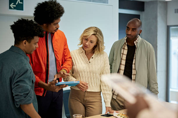 istock Business Team Discussing Project Details After Meeting 1333137252