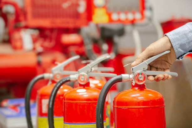 istock Engineer inspection Fire extinguisher and fire hose,Ready to use in the event of a fire.Safety first concept. 1333138259