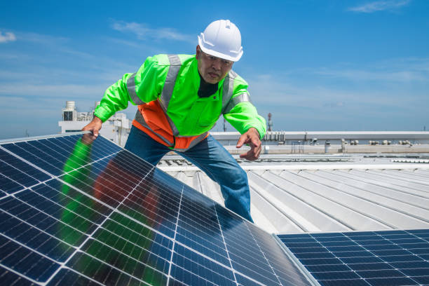 istock Engineer wearing unifrom and helmet inspect and check solar cell panel ,solar cell is ecology energy sunlight power installation for industrail ,alternative environment power concept. 1333139763