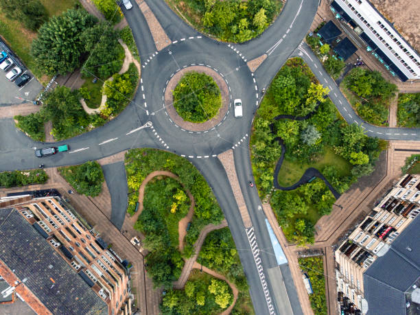 The Climate Resilient Neighbourhood Drone images of "Klimakvarteret", the Climate Resilient Neighbourhood in Østerbro. This area is Copenhagen´s first district to adapted to climate change and to withstand the large volumes of water expected with more extreme weather conditions. The solution is to build large interconnected reservoirs collecting rain water from the city streets, roofs and surfaces. The reservoirs have resulted in large green, recreative areas which invite for picnics, playgrounds and new habitats for urban wildlife supporting biodiversity. adaptation to nature stock pictures, royalty-free photos & images