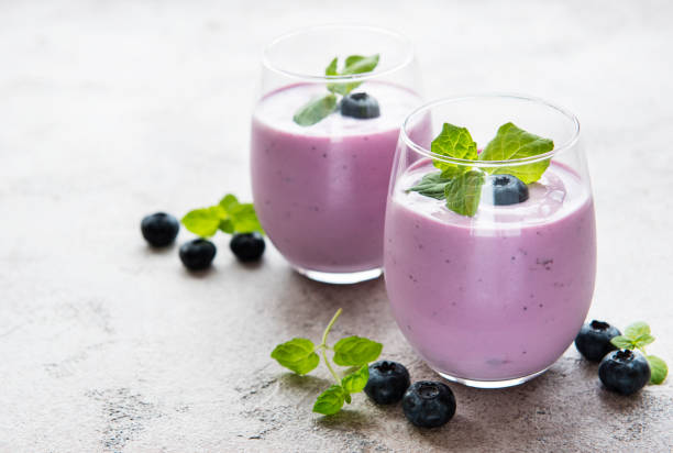 istock Glasses of blueberry yogurt with blueberries 1333140945