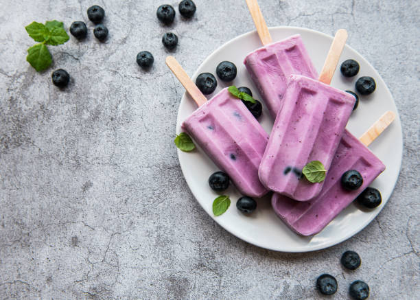 istock Ice cream popsicles from fresh organic blueberries. 1333140955