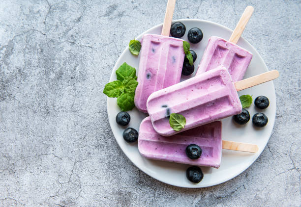 istock Ice cream popsicles from fresh organic blueberries. 1333140968