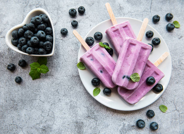 istock Ice cream popsicles from fresh organic blueberries. 1333140969
