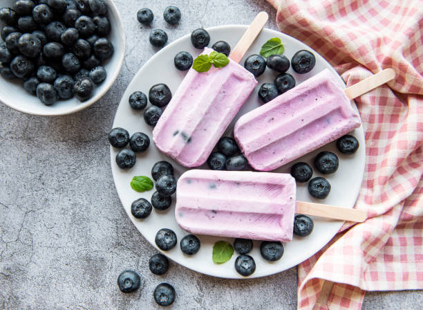 istock Ice cream popsicles from fresh organic blueberries. 1333140970