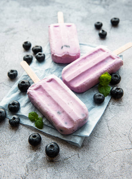 istock Ice cream popsicles from fresh organic blueberries. 1333140971