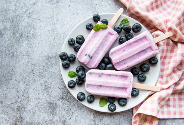 istock Ice cream popsicles from fresh organic blueberries. 1333140974