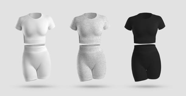 istock Mockup crop top, cycling shorts, compression suit 3D rendering in white, black, gray heather, isolated on background 1333141059