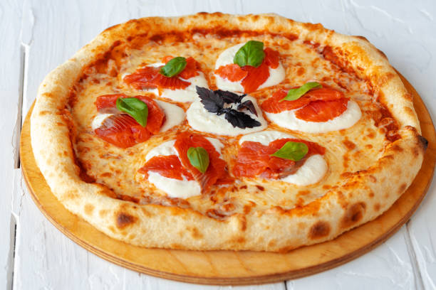 istock Hot pizza Margherita on white wooden table 1333143831