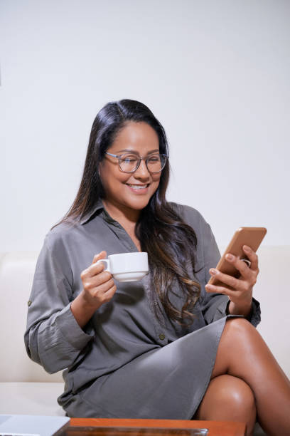 istock Elegant Businesswoman Drinking Coffee 1333146525
