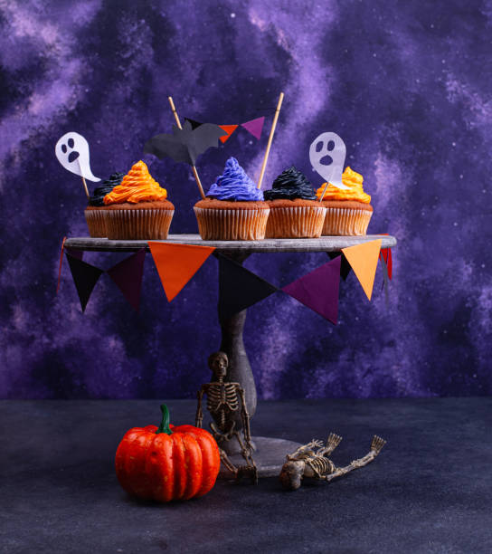 istock Halloween cupcakes with color cream 1333147555