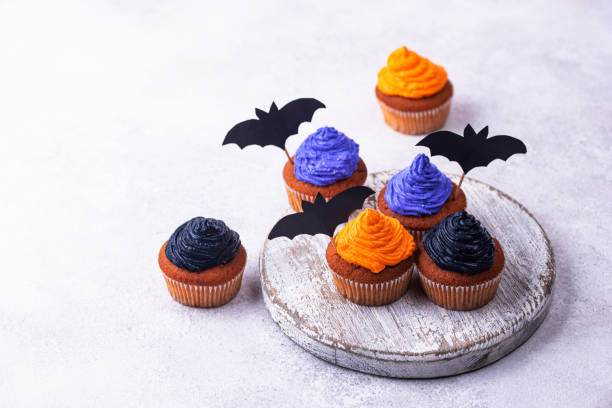 istock Halloween cupcakes with color cream 1333147561