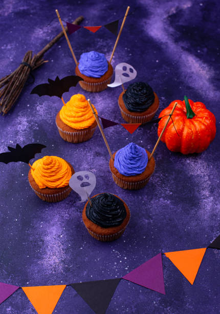 istock Halloween cupcakes with color cream 1333147564