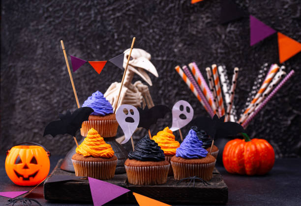 istock Halloween cupcakes with color cream 1333147565