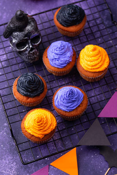 istock Halloween cupcakes with color cream 1333147570