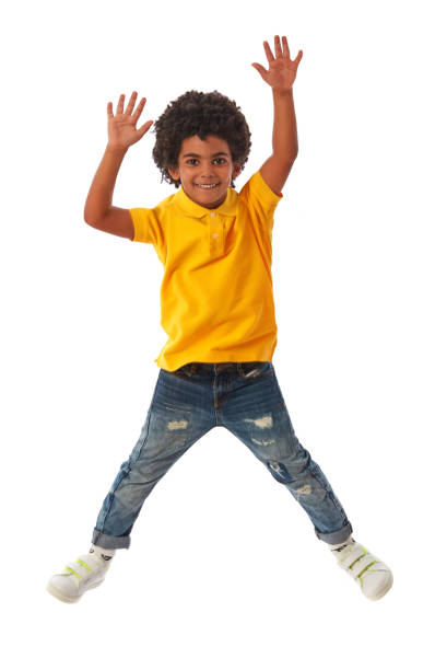 istock Afro-american kid jumping of happiness 1333151073