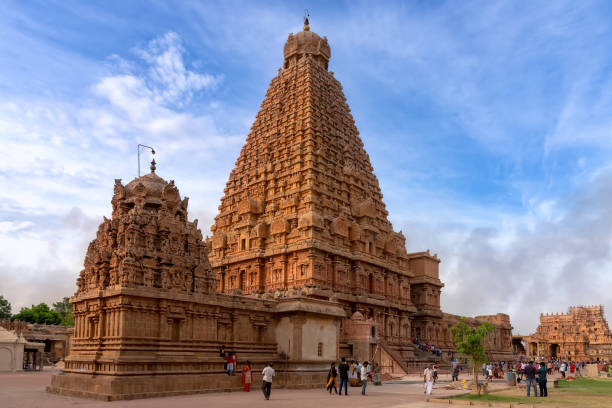 The majestic Brihadisvara Temple in Thanjavur, India Thanjavur, India - August 22, 2018: View of the majestic Brihadisvara Temple with pilgrims. This Hindu temple is one of the most visited tourist attractions in Tamil Nadu dravidian culture stock pictures, royalty-free photos & images