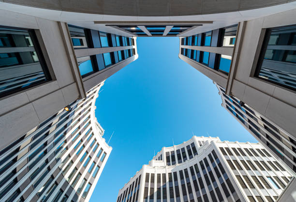 istock Low Angle View Of Modern Buildings Against Clear Blue Sky 1333151885
