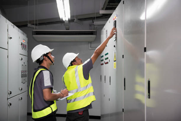 istock Electrical engineering with inspector while training and recording in operation of power in the plant for production process, routine daily record 1333152402