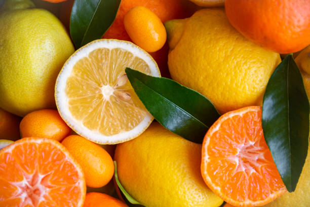 istock Mixed citrus fruits, ripe and fresh with leaves 1333154570