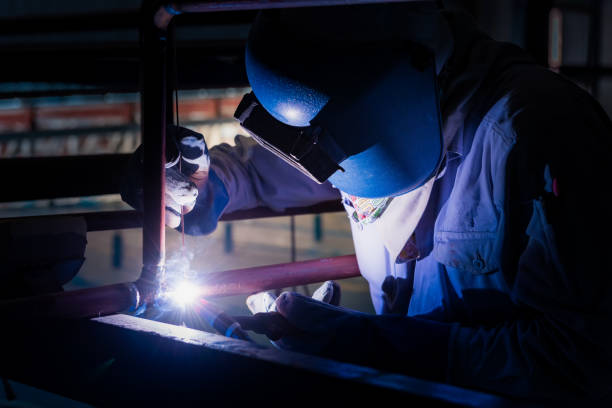 istock Welding steel pipe with Mig-Mag method for industrial work. Gas metal arc welding 1333155075