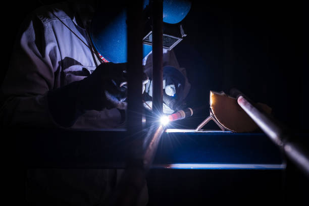 istock Welding steel pipe with Mig-Mag method for industrial work. Gas metal arc welding 1333155085