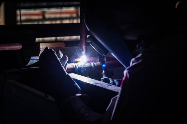 istock Welding steel pipe with Mig-Mag method for industrial work. Gas metal arc welding 1333155088