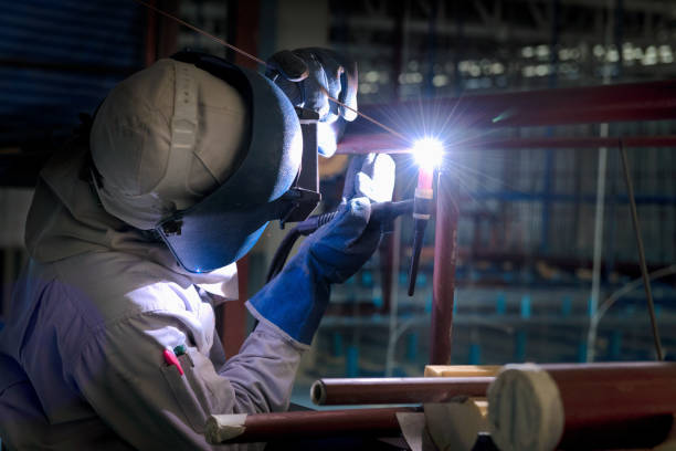 istock Welding steel pipe with Mig-Mag method for industrial work. Gas metal arc welding 1333155093