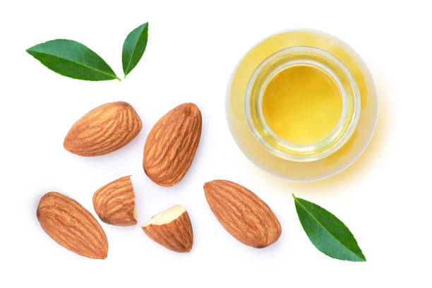 istock Almond oil and almond nuts 1333155332