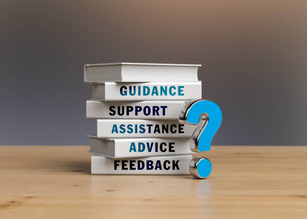 Blue-colored question mark and stack of books. Blue-colored question mark and stack of books. Horizontal composition with copy space. guidance stock pictures, royalty-free photos & images