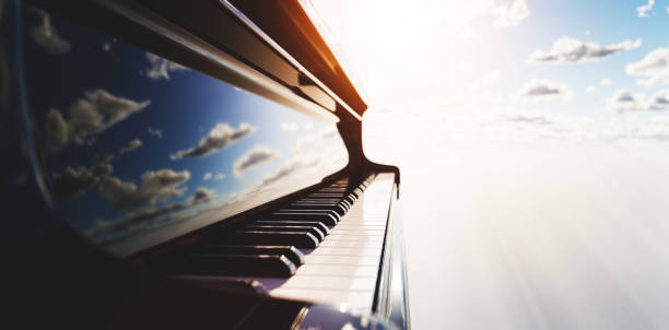 istock Grand piano keyboard on blue sky 1333157657