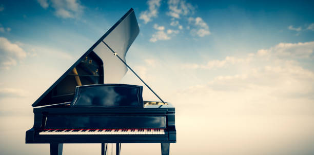 istock Grand piano on sunset sky background 1333157661