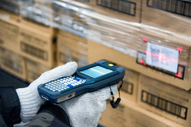 Bluetooth barcode scanner checking goods in the cold room or warehouse stock photo