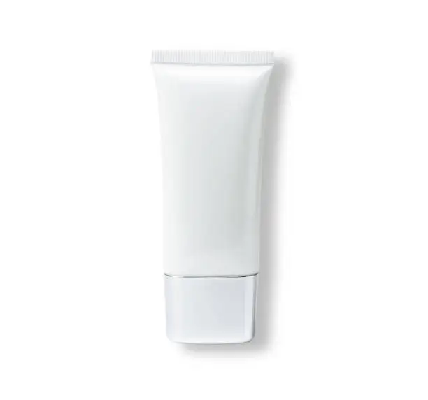 White plastic skincare cream tube isolated on white background. Clipping path. Top view. Flat lay.