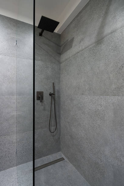 istock Shower with glass wall and granite tiles 1333162376