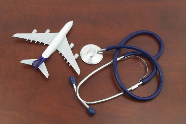 istock Airplane model and stethoscope close up. 1333165385